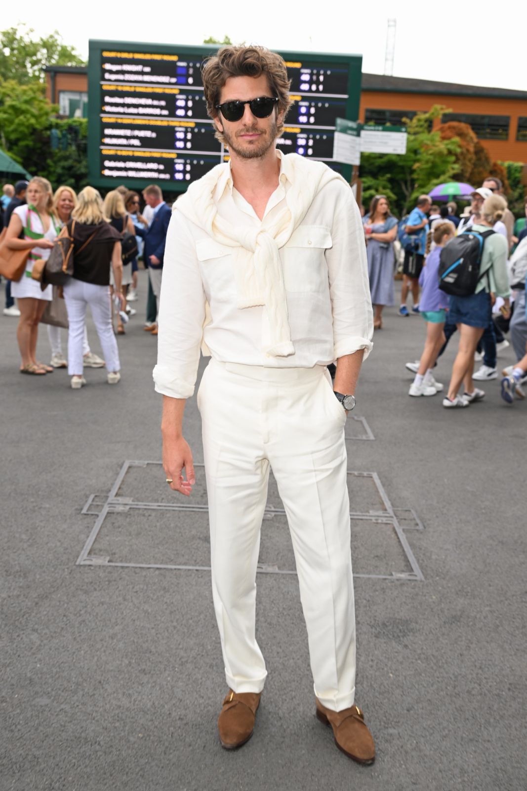LONDON, ENGLAND - JULY 06: Andrew Garfield, wearing Ralph Lauren, attends day seven of the Wimbledon Tennis Championships at the All England Tennis and Croquet Club on July 06, 2025 in London, England. (Photo by Karwai Tang/Getty Images for Ralph Lauren)