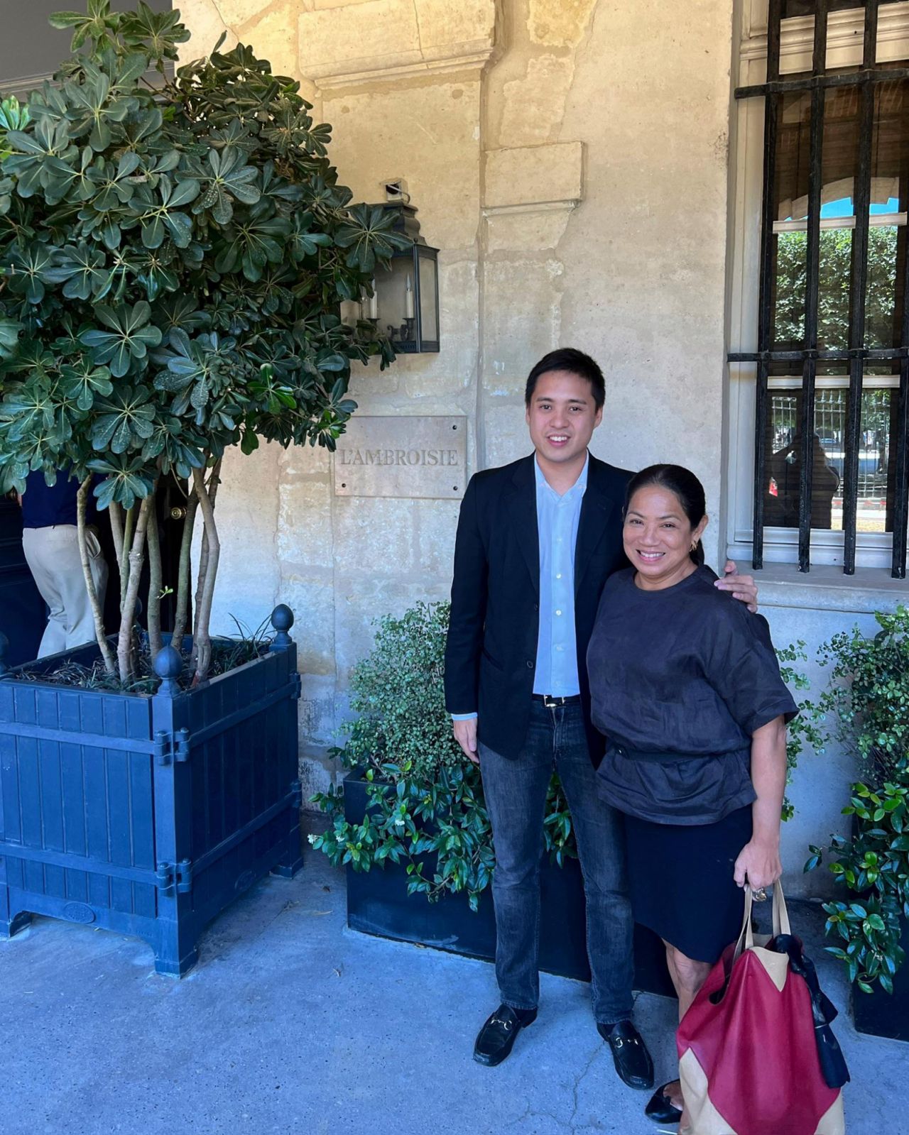 Amado Forés, who is now the President and Chief Executive Officer (CEO) of CIBO, shares a photo of himself and his late mother, chef Margarita Forés.
