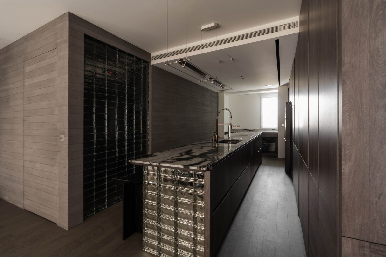 Glass bricks by Ornate+ adds texture to the apartment