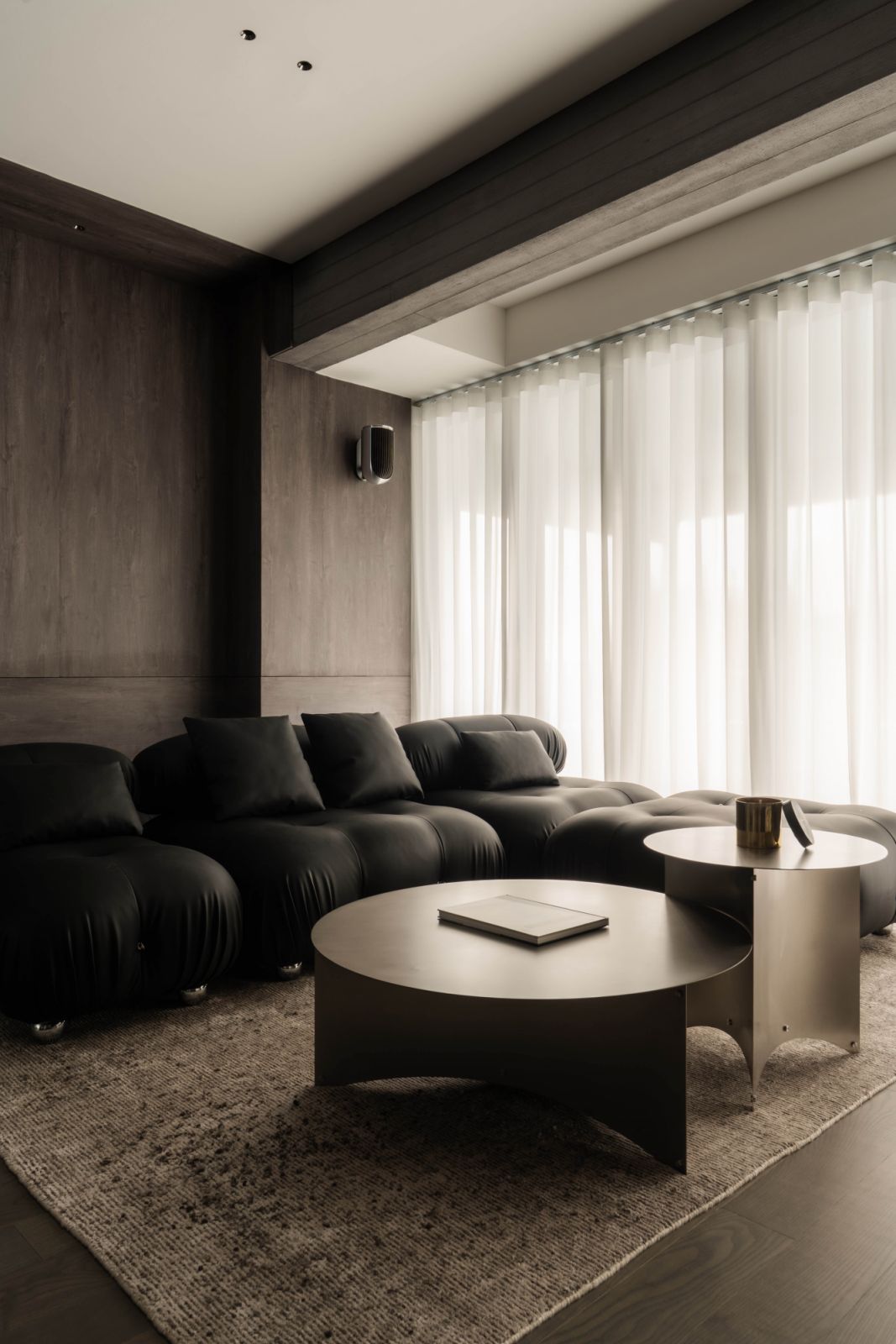 Choo is proudest of the expansive social zone that unites the apartment’s living, dining and kitchen areas