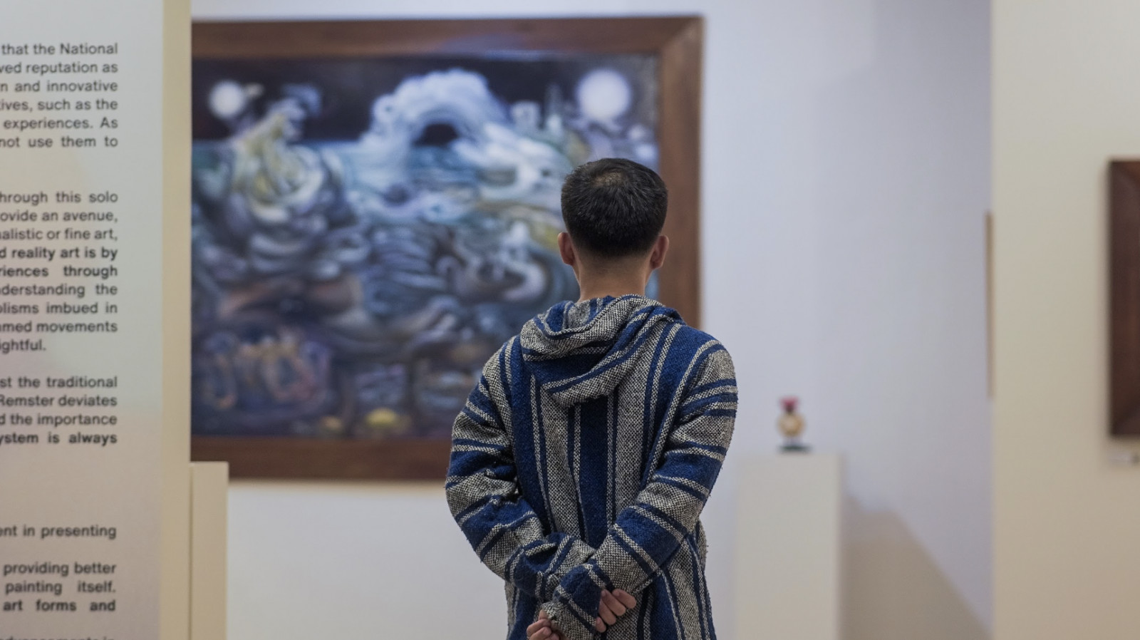 Artist Remster Bautista photographed from behind