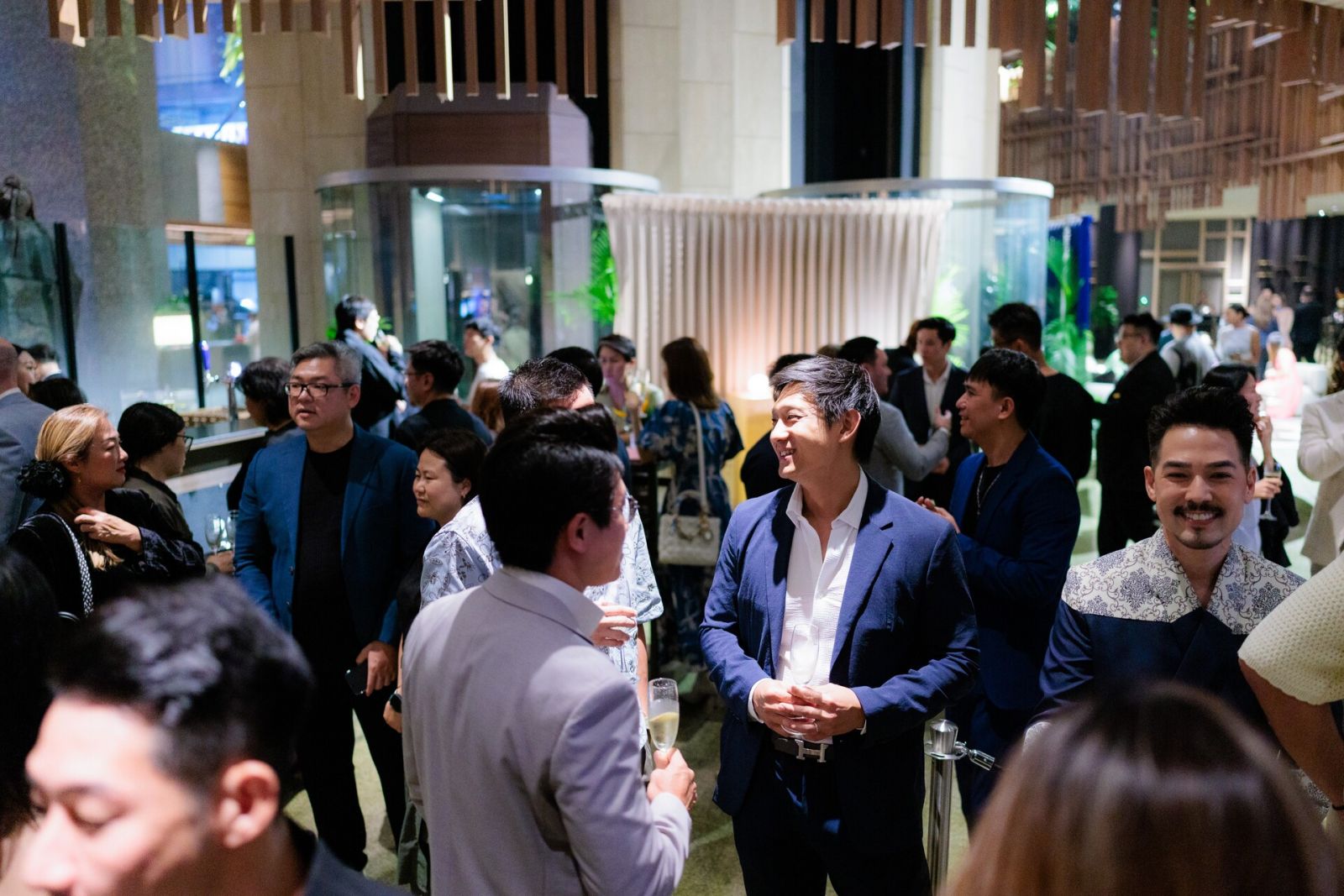 Guests mingling at the foyer at the start of the evening