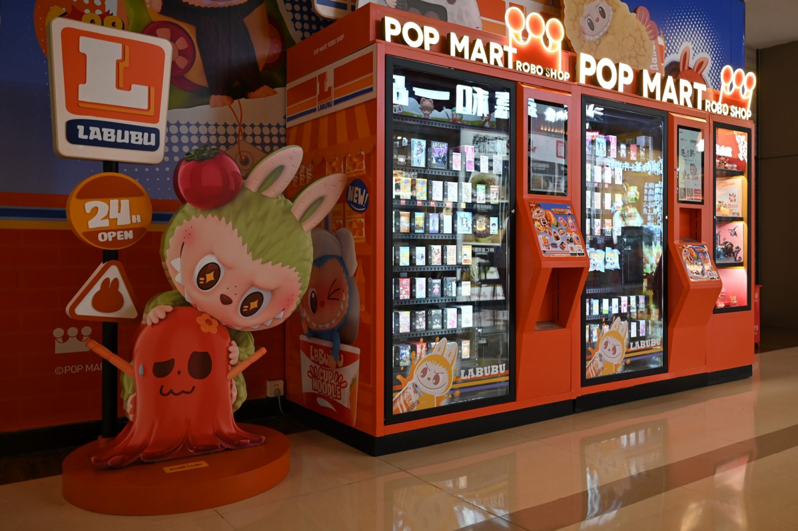 Pop Mart in China
PRODUCTION - 10 July 2025, China, Peking: A vending machine with Pop Mart toy figures is located in a shopping mall. Next to the machine is a display with the words "Labubu 24h open". Photo: Johannes Neudecker/dpa (Photo by Johannes Neudecker/picture alliance via Getty Images)