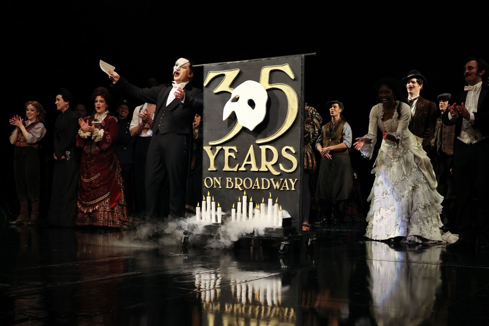 NEW YORK, NEW YORK - JANUARY 26: Cast members celebrate onstage at the 35th anniversary performance of Andrew Lloyd Webber's "The Phantom of the Opera" on Broadway at the Majestic Theatre on January 26, 2023 in New York City. (Photo by Dia Dipasupil/Getty Images)