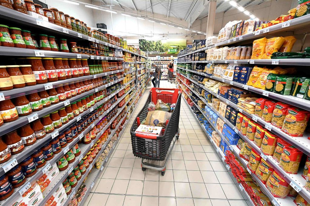 Shopping cart in a department of a Carrefour supermarket, in front of pastas and sauces. (Photo by: Jarry S/Andia/Universal Images Group via Getty Images)