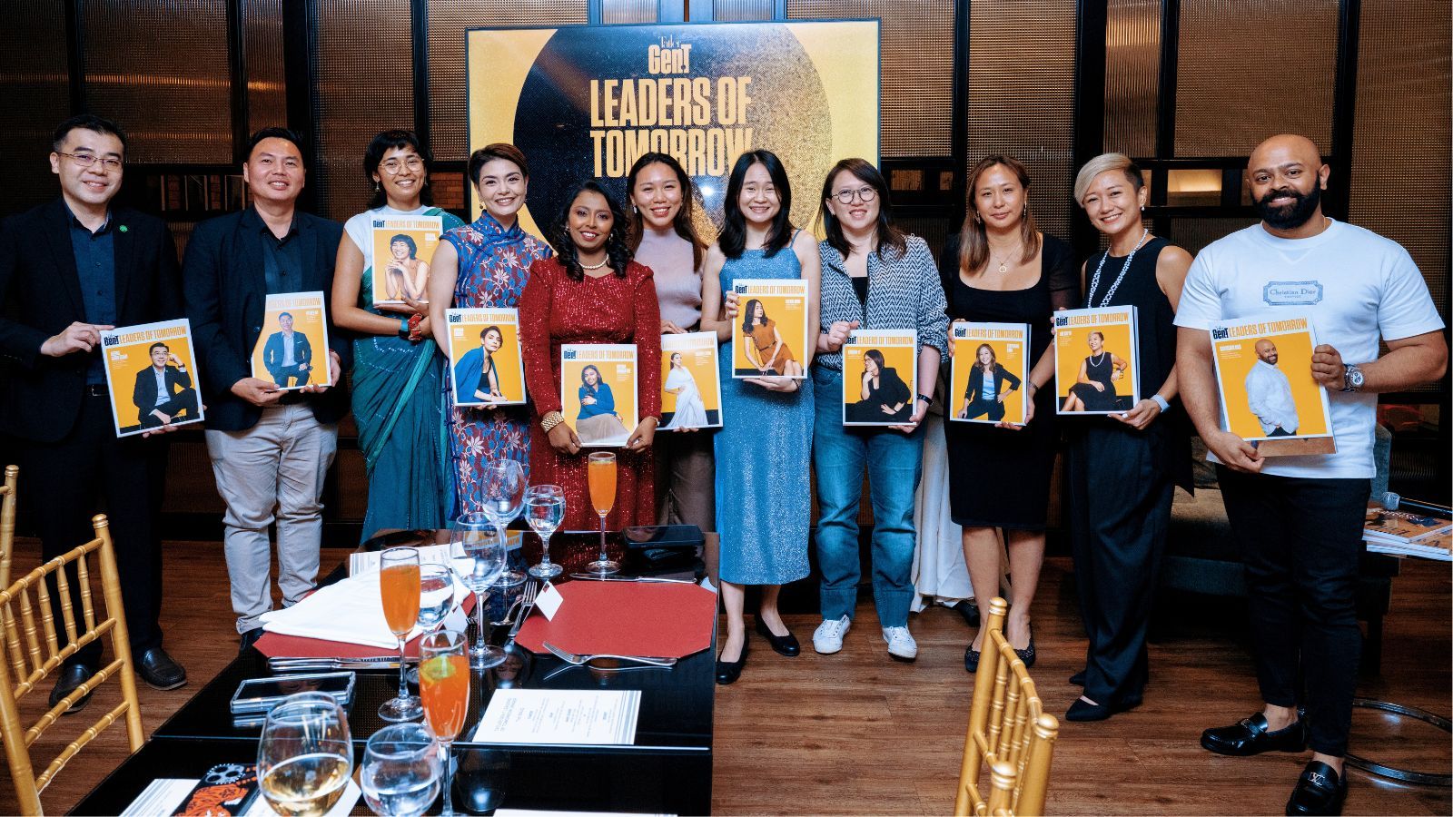 The 2025 cohort of Tatler Gen.T Leaders of Tomorrow from Malaysia with their personalised magazine covers (Photo: Fady Younis)