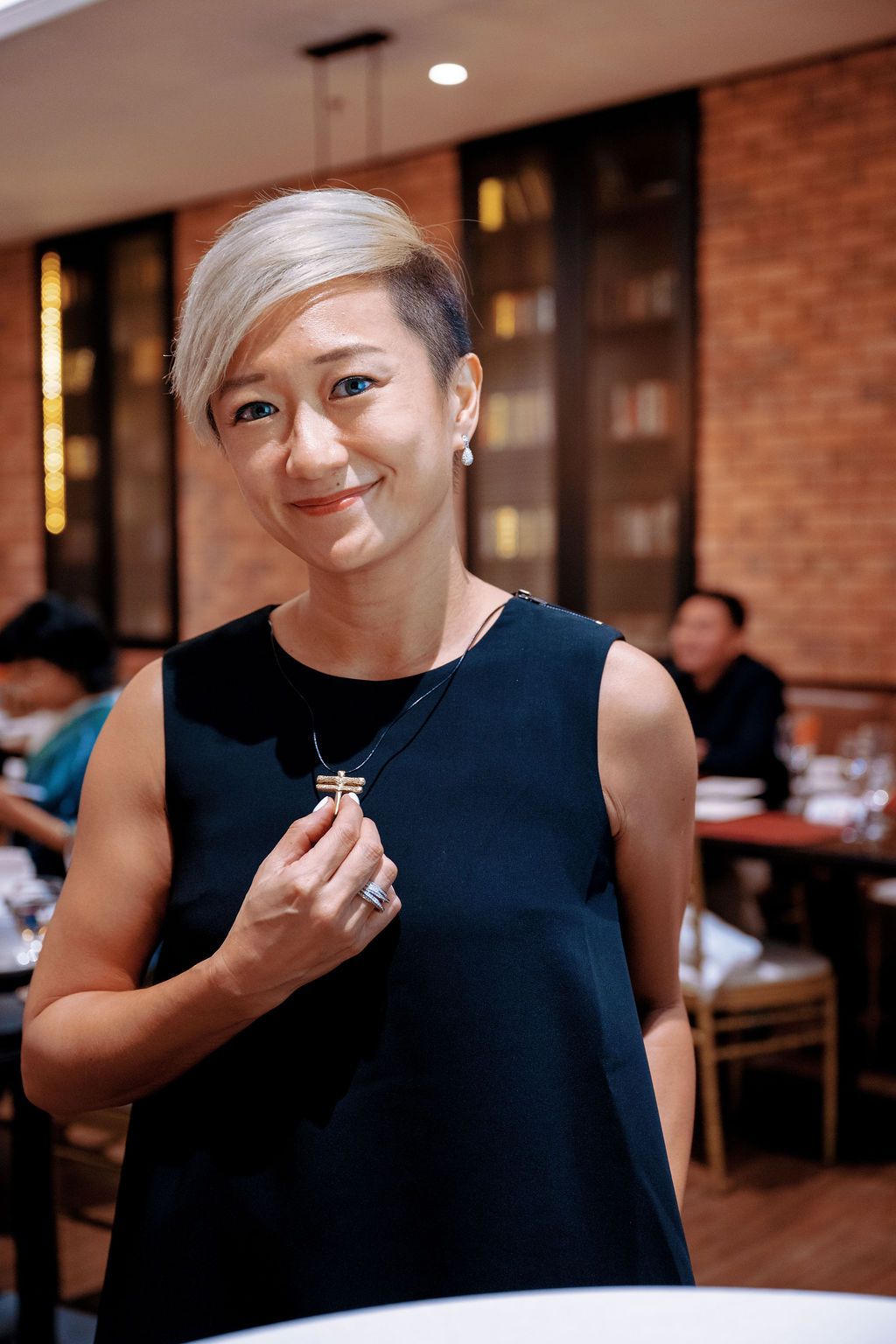 Lim Xin Yu shows off her new dragonfly token courtesy of the Dragonfly 360 Summit