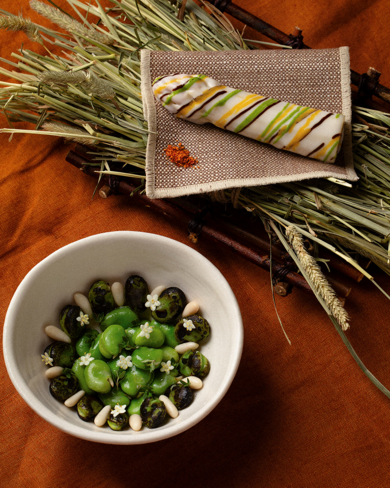 Fermented ricotta stars in a vibrant salad, alongside fava beans, pine nuts, and white asparagus (Photo: Somma) best fermentation restaurant chef singapore