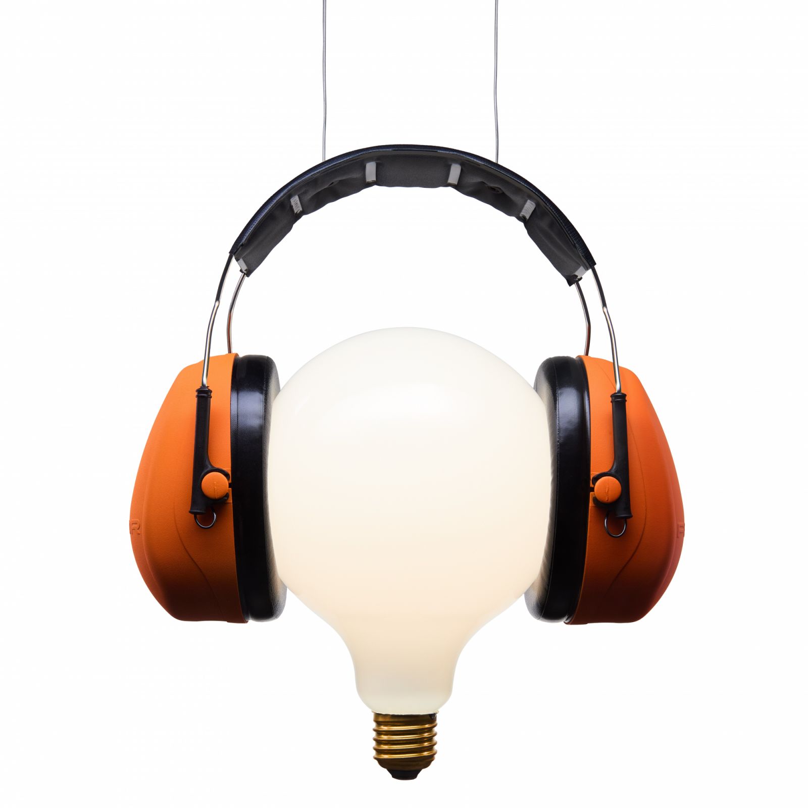 Ingo Maurer’s Shhh! encases its glow inside a pair of industrial earmuffs