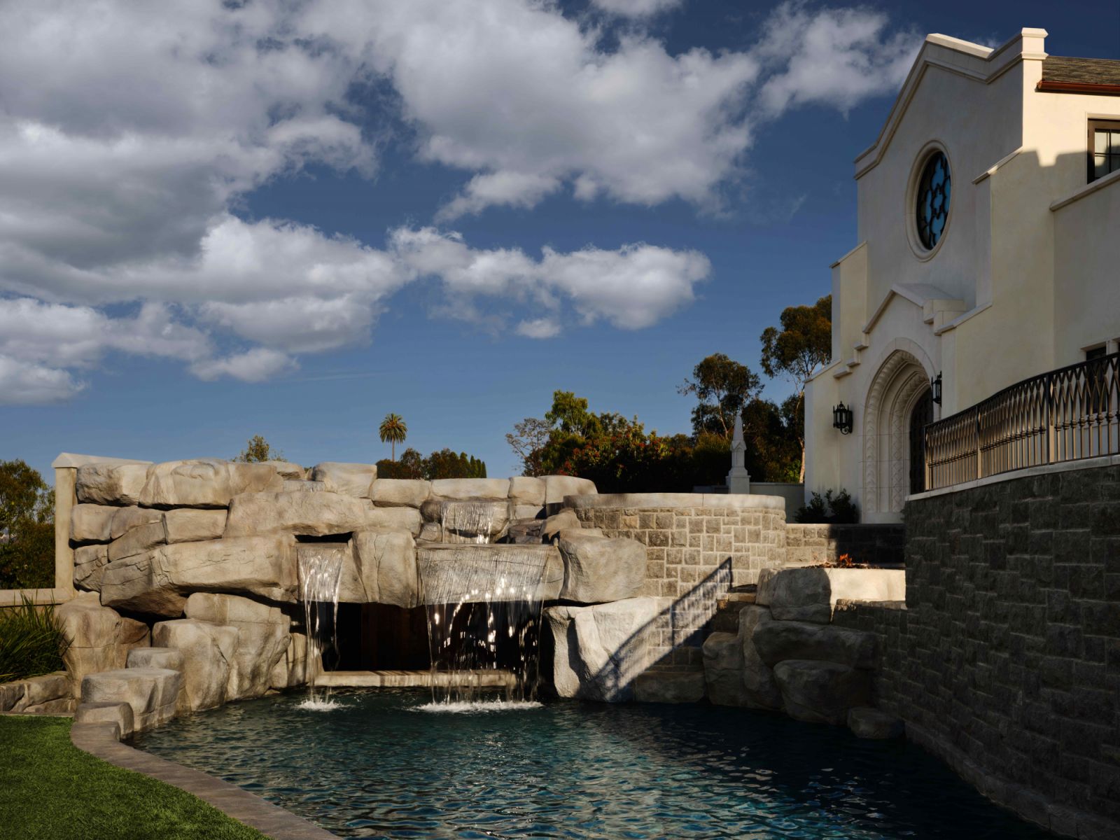 Hidden passages lead to the swim-up pool bar at the back of the residence