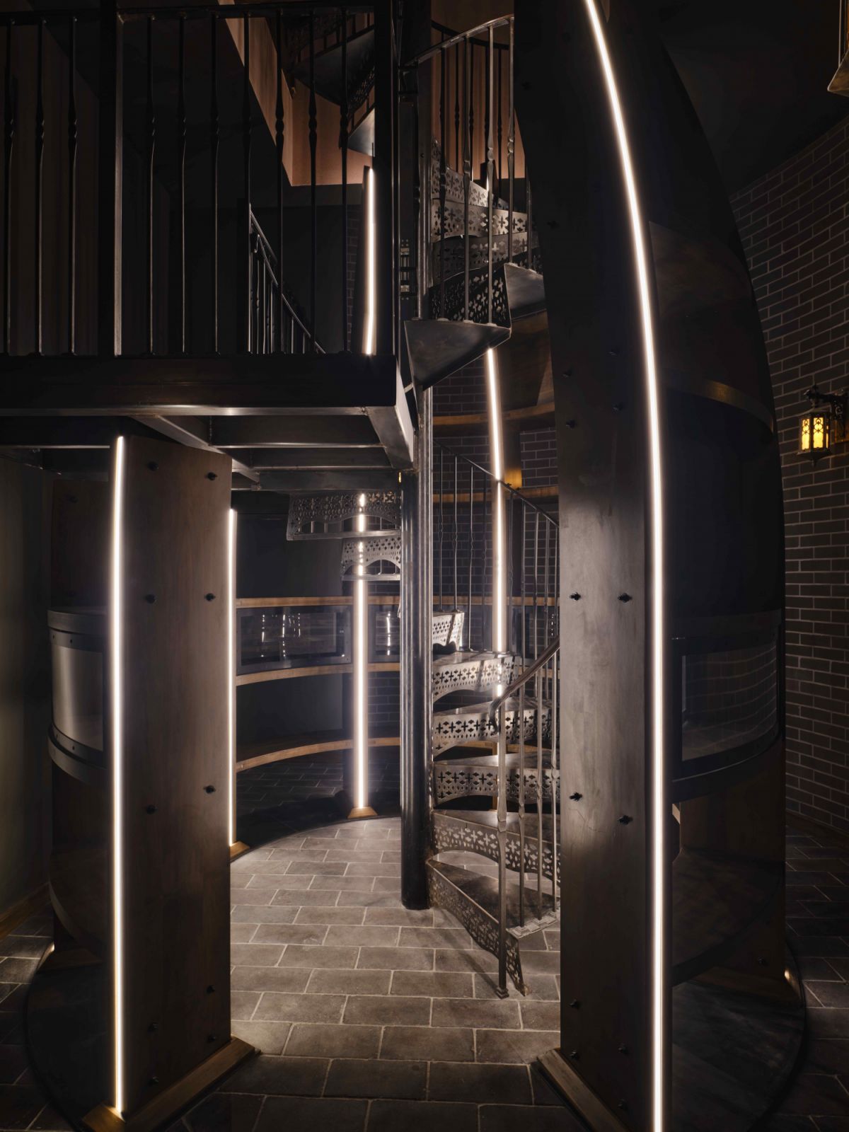 The cloistered staircase leads to an unexpected subterranean retreat