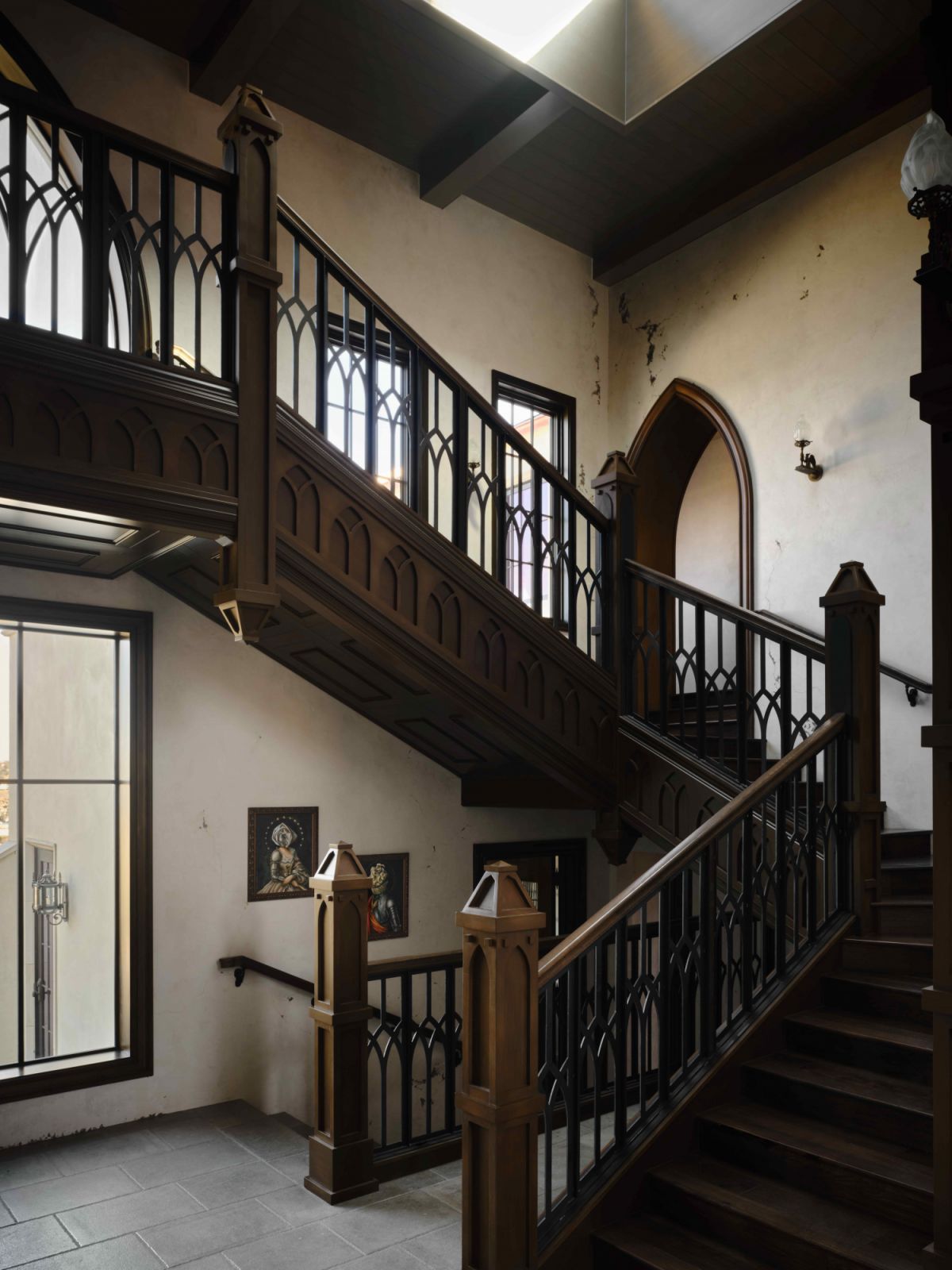 The staircase evokes the grittiness of the medieval era