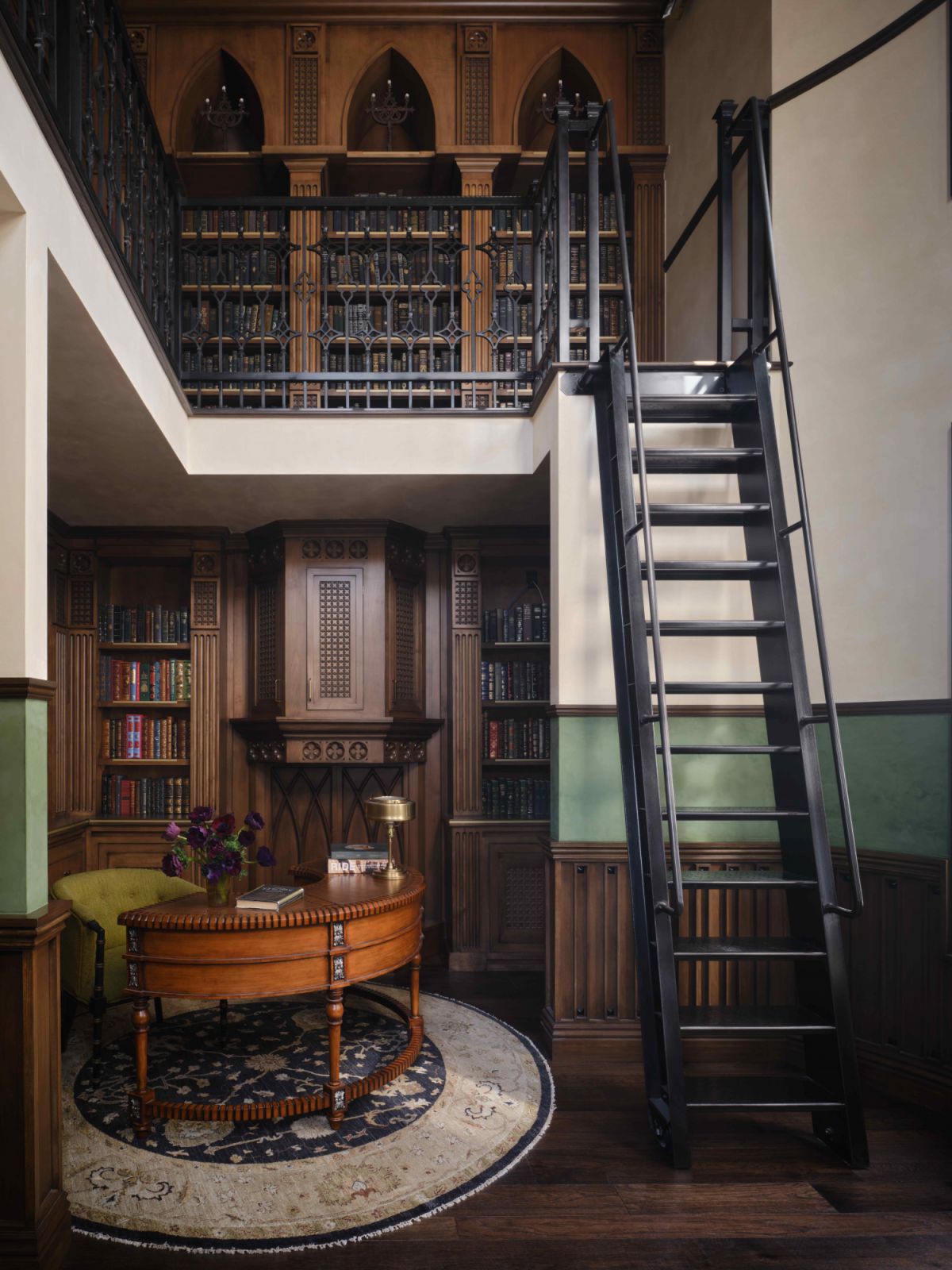 The double-volume library with a study desk