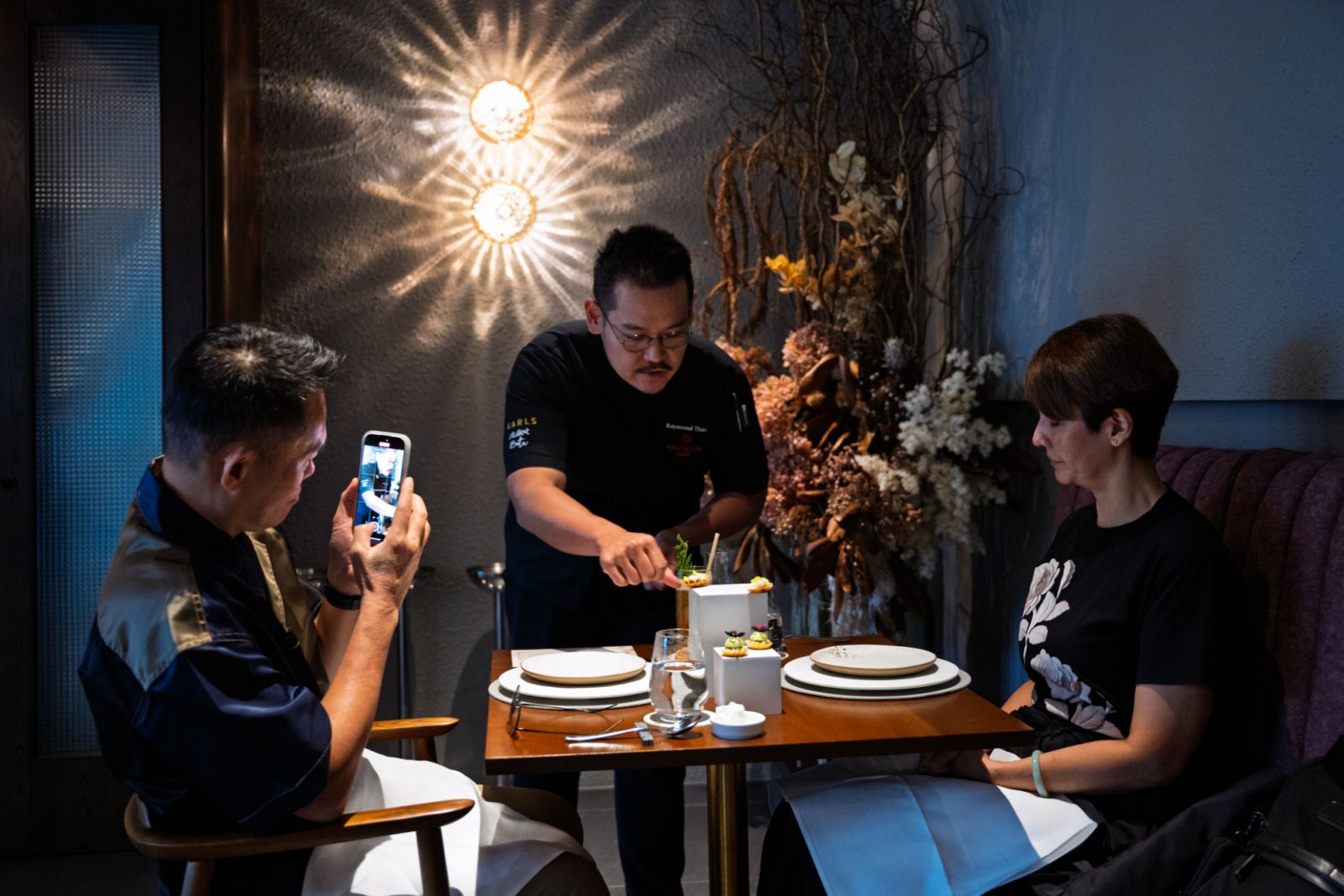 Chef Raymond Tham attending to his guests