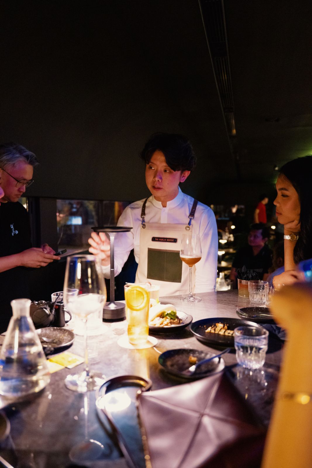 William Wu explaining to guests about his drinks at Reka:Bar