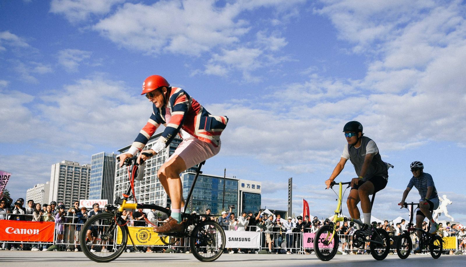 Brompton CEO Will Butler‑Adams (pictured extreme left in a striped blazer) at the Brompton World Championship China 2024
