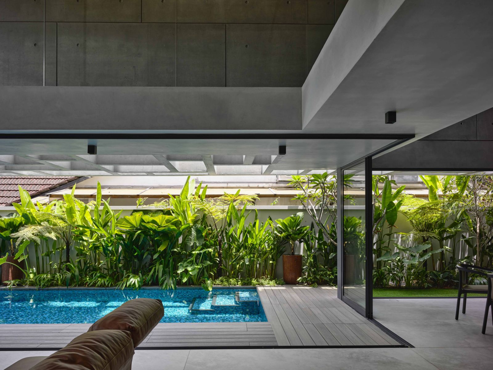 A 15-metre lap pool helps cool the ambient temperature of the first-storey common spaces