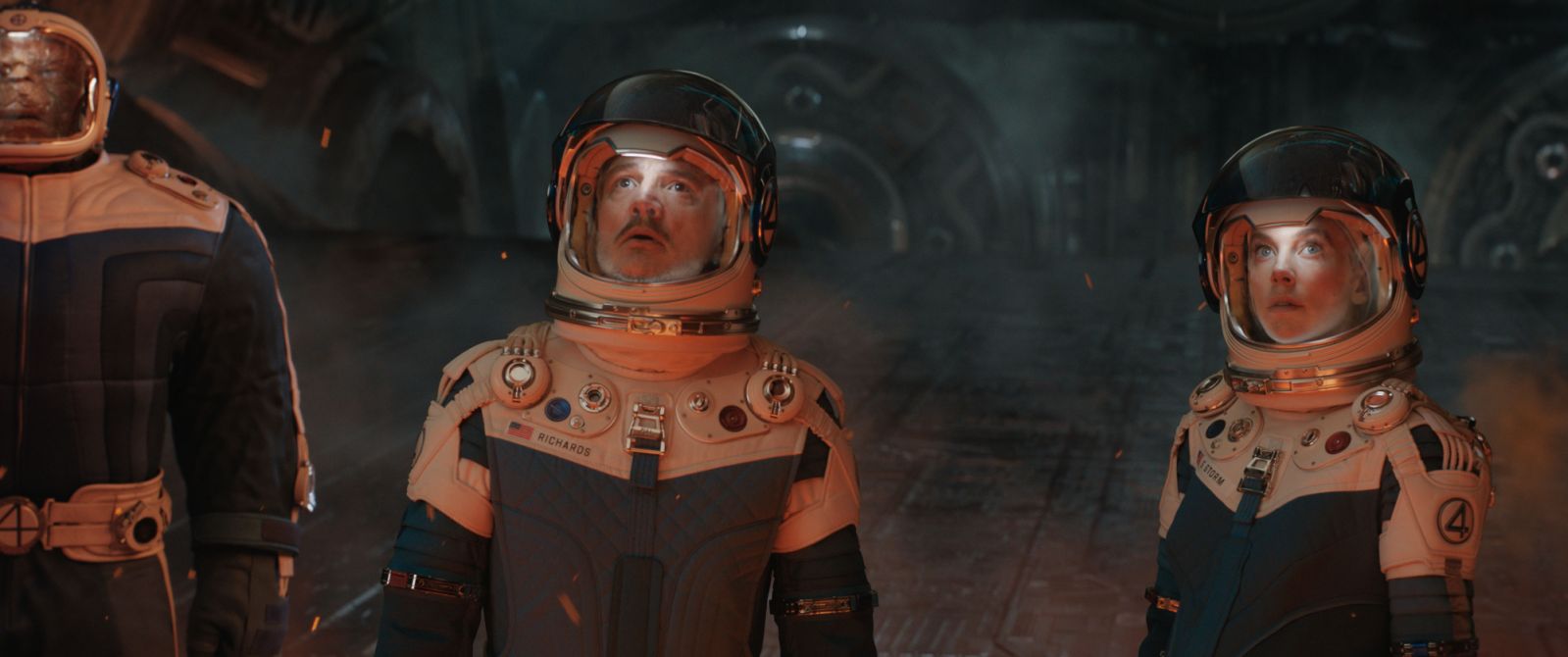 Ebon Moss-Bachrach as Ben Grimm/The Thing, Pedro Pascal as Reed Richards/Mister Fantastic and Vanessa Kirby as Sue Storm/Invisible Woman in 20th Century Studios/Marvel Studios' THE FANTASTIC FOUR: FIRST STEPS. Photo courtesy of Marvel Studios. © 2025 20th Century Studios / © and ™ 2025 MARVEL