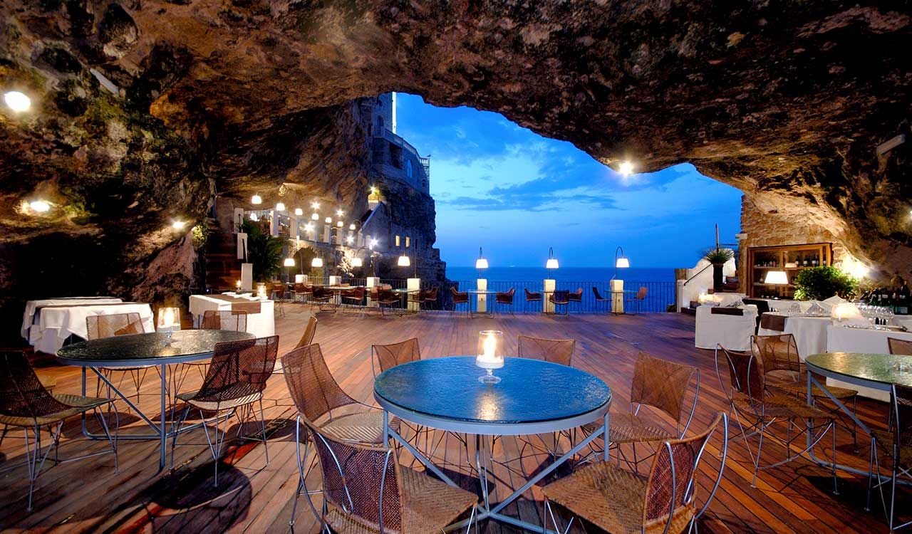 Cave restaurants around the world transform natural rock formations into unforgettable dining destinations. (Photo: Grotta Palazzese)