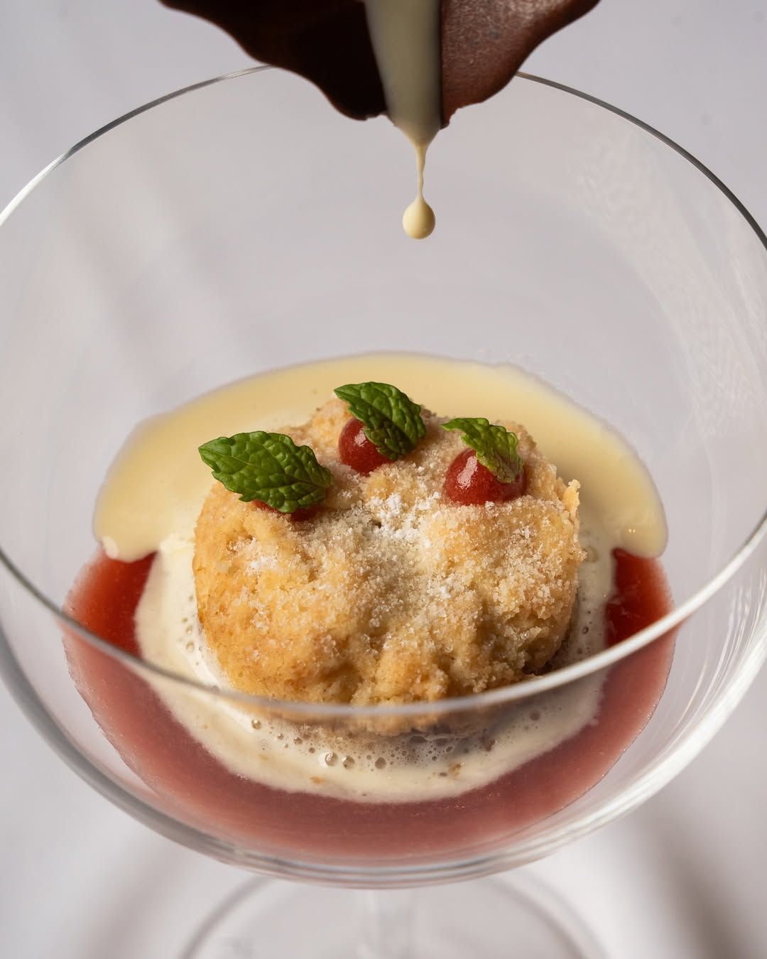 Rhubarb & granny smith apple crumble, honey sabayon & crème anglaise (Photo: Instagram / @restaurantdominic)
