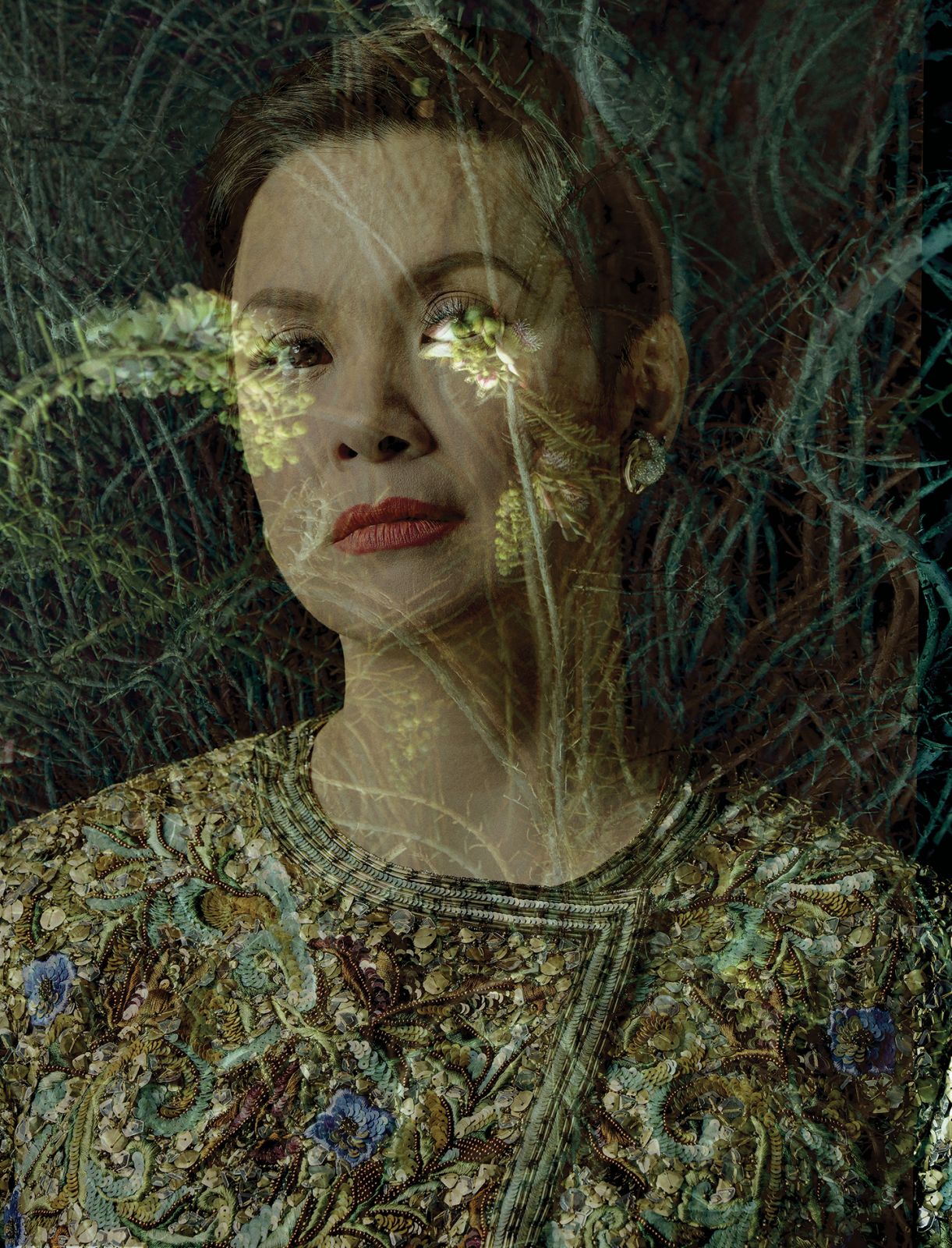 Salonga wears Valentino jacket and Brent Neale earrings