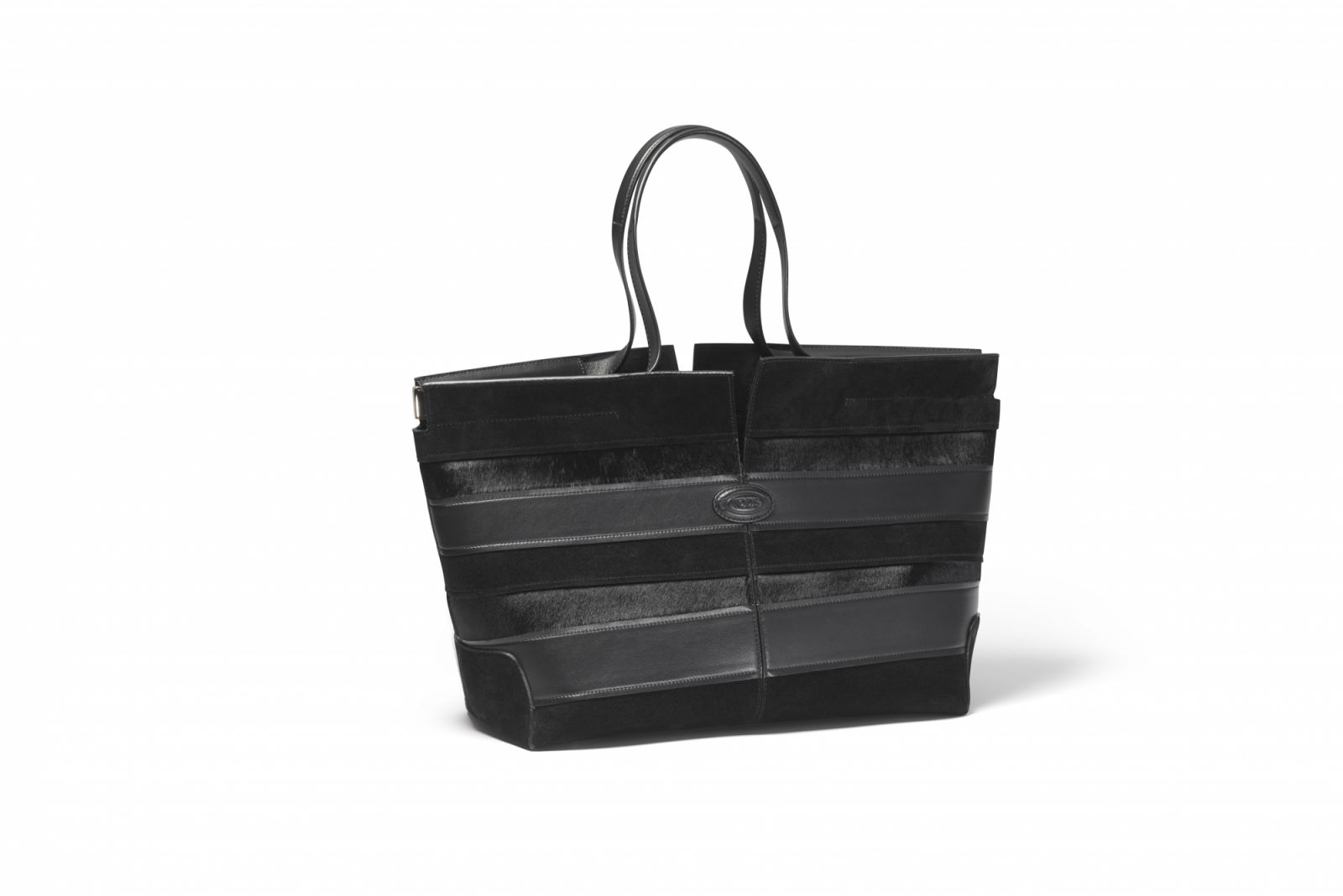 The versatility of Tod's Di Folio bag in monochrome is a wardrobe staple