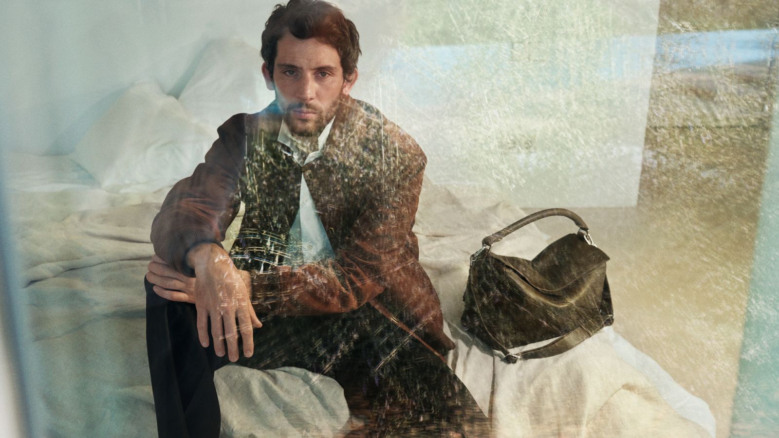 Between posture and pause, Greta Lee and Josh O’Connor become vessels for Loewe’s unforgettable elegance