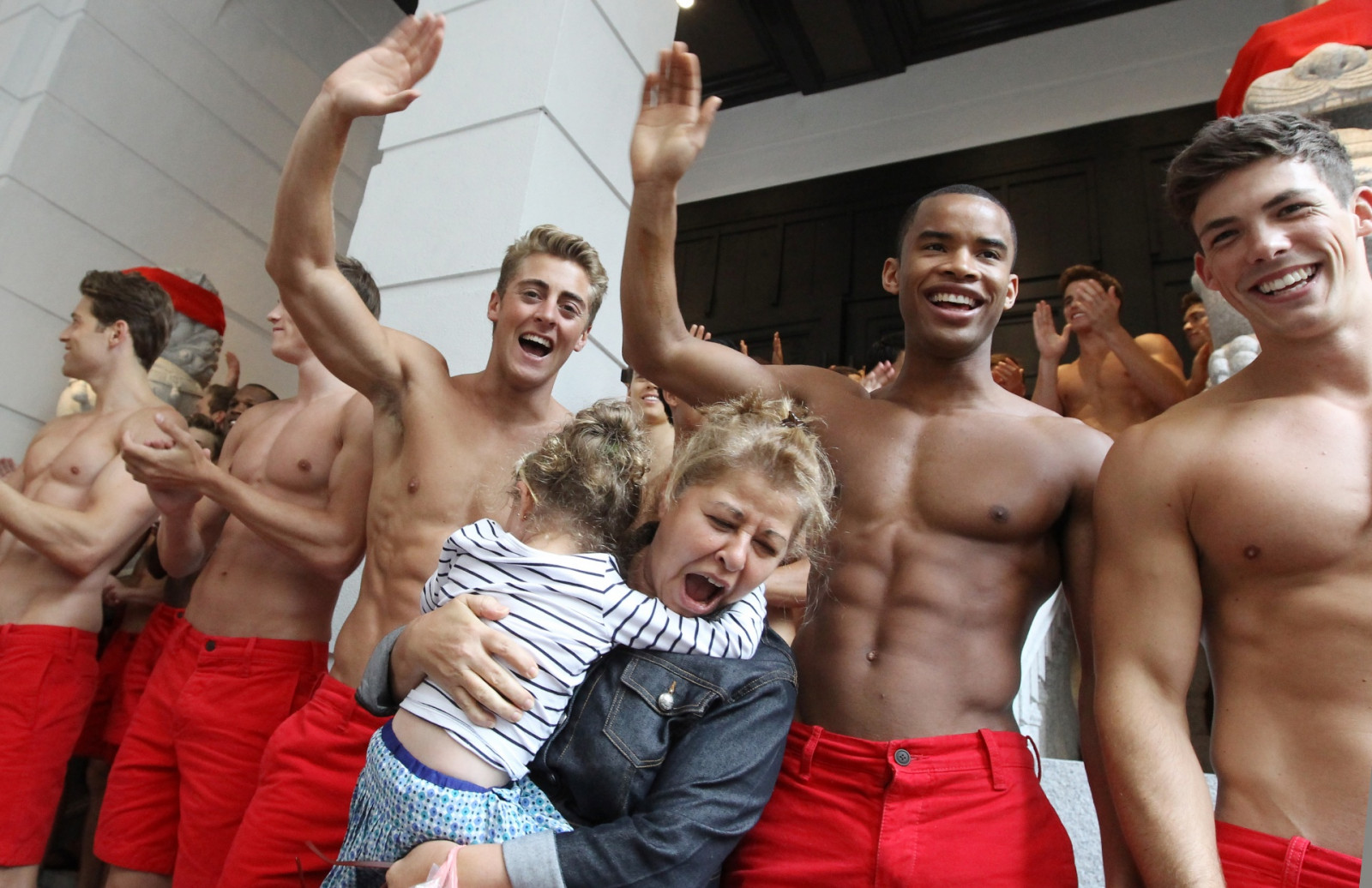 Models gather for promotion at the new Abercrombie & Fitch shop (not open yet) in Central. 03AUG12