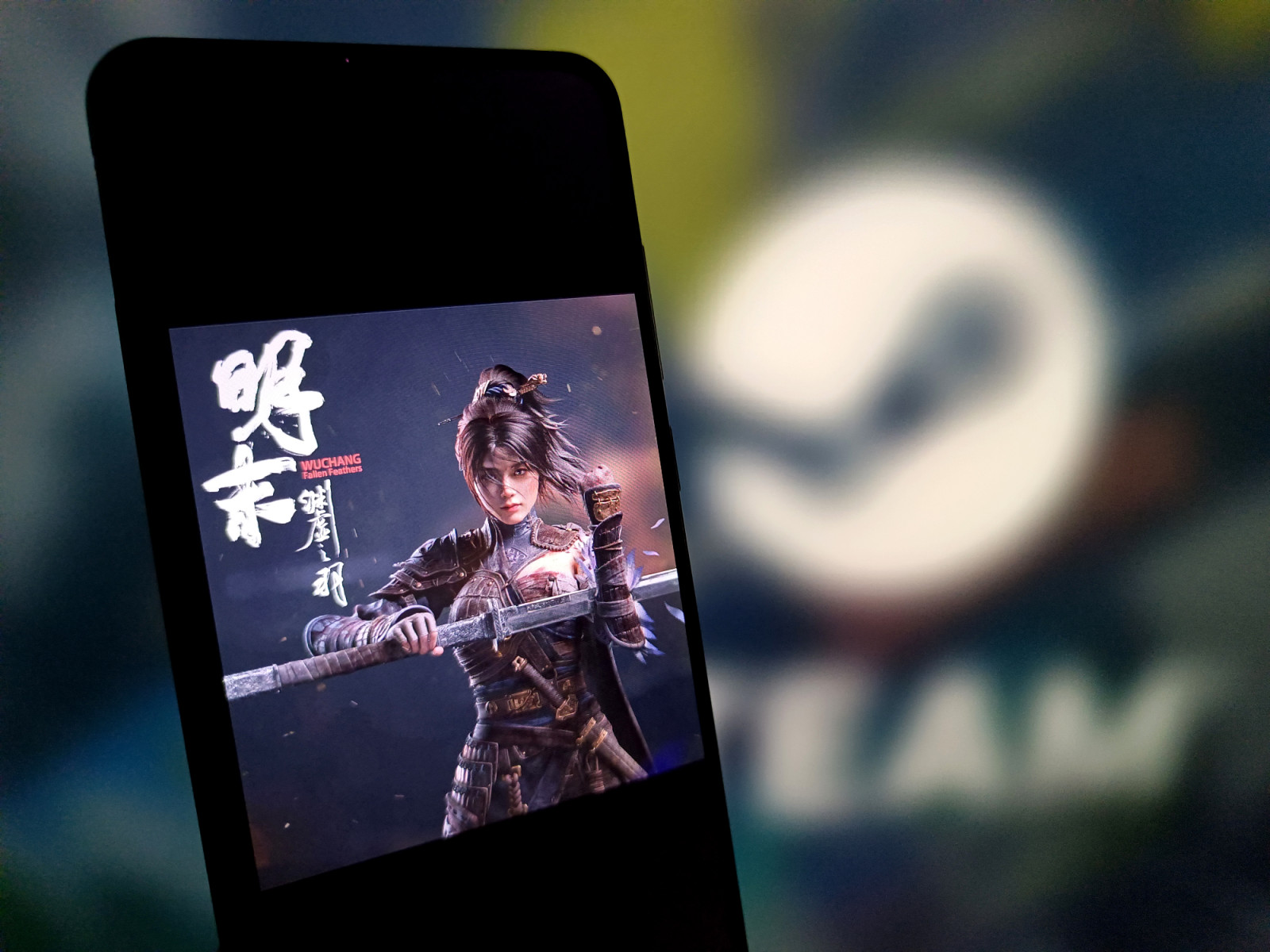 SUQIAN, CHINA - JUNE 22: In this photo illustration, the role-playing game "Wuchang: Fallen Feathers" is displayed on a smartphone screen with a Steam logo in the background on July 22, 2025 in Suqian, Jiangsu Province of China. "Wuchang: Fallen Feathers," a game set in the Ming Dynasty (1368-1644), was launched globally on July 24, capitalizing on the cultural momentum ignited by last year's release of "Black Myth: Wukong." (Photo by VCG/VCG via Getty Images)