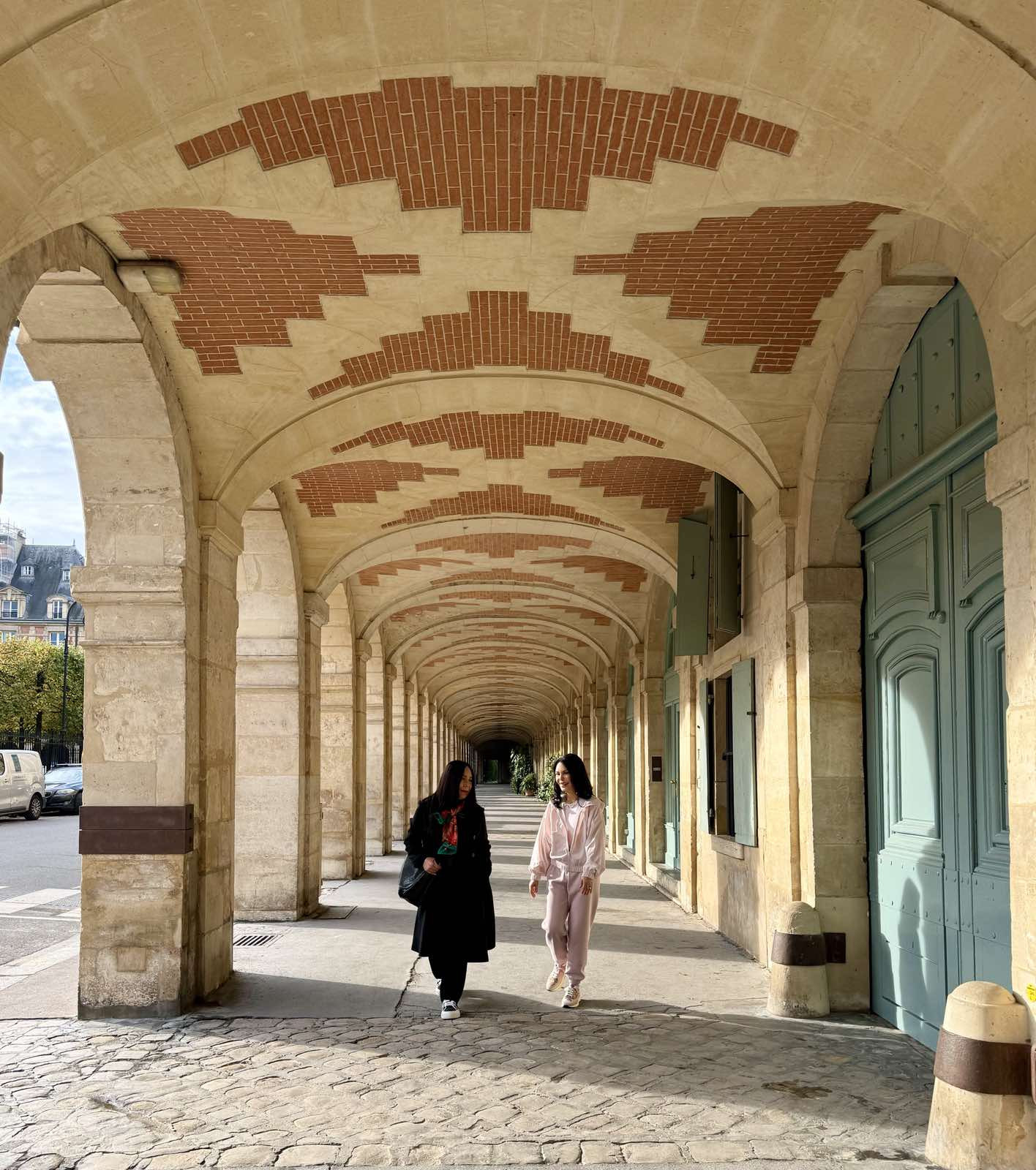 Tina Cuevas and Ching Cruz at Place des Vosges