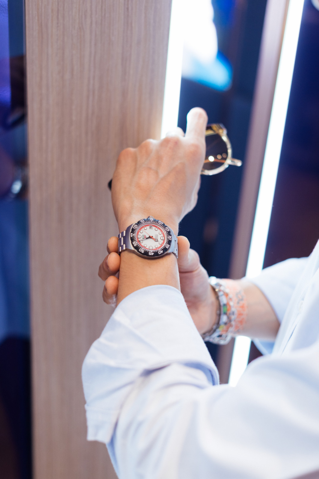 A guest trying on the Tag Heuer Formula 1 Solargraph