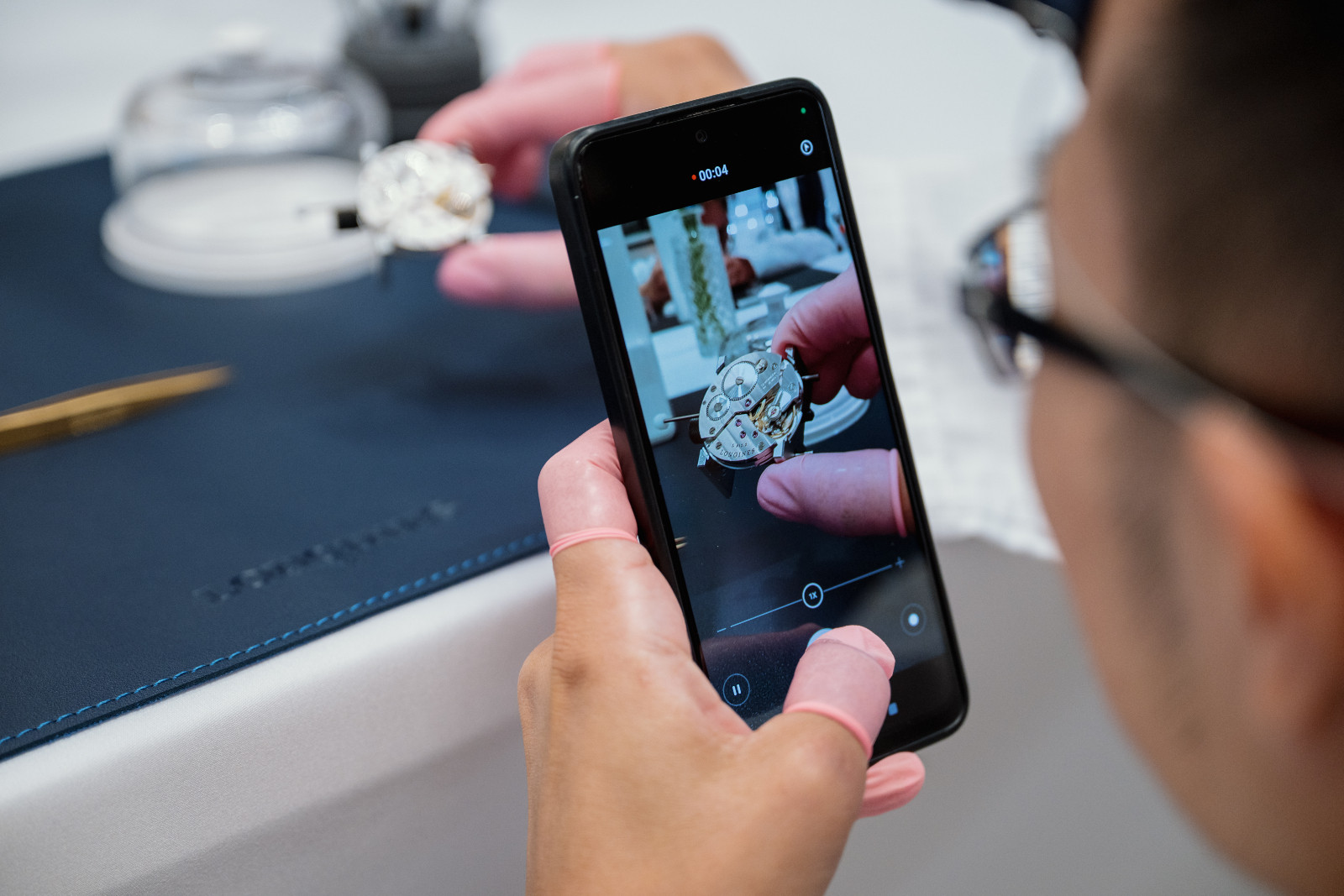 A guest taking a photo of his handiwork