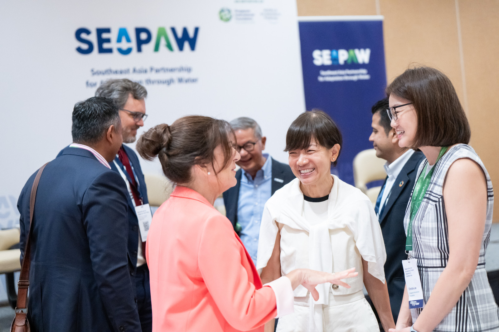 Corinna Chan, CEO (foreground, second from right) engages in conversation with fellow delegates during the Water at the Core: Accelerating Climate Adaptation in Southeast Asia event, convened by the Singapore International Foundation, as part of its Southeast Asia Partnership for Adaptation through Water (SEAPAW)