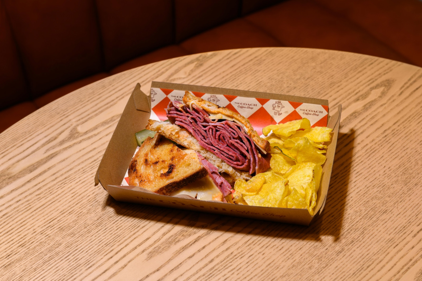 The Reuben promises corned beef with sauerkraut and Swiss cheese in between house-made rye sourdough Coach Coffee Shop Singapore Resort World Sentosa