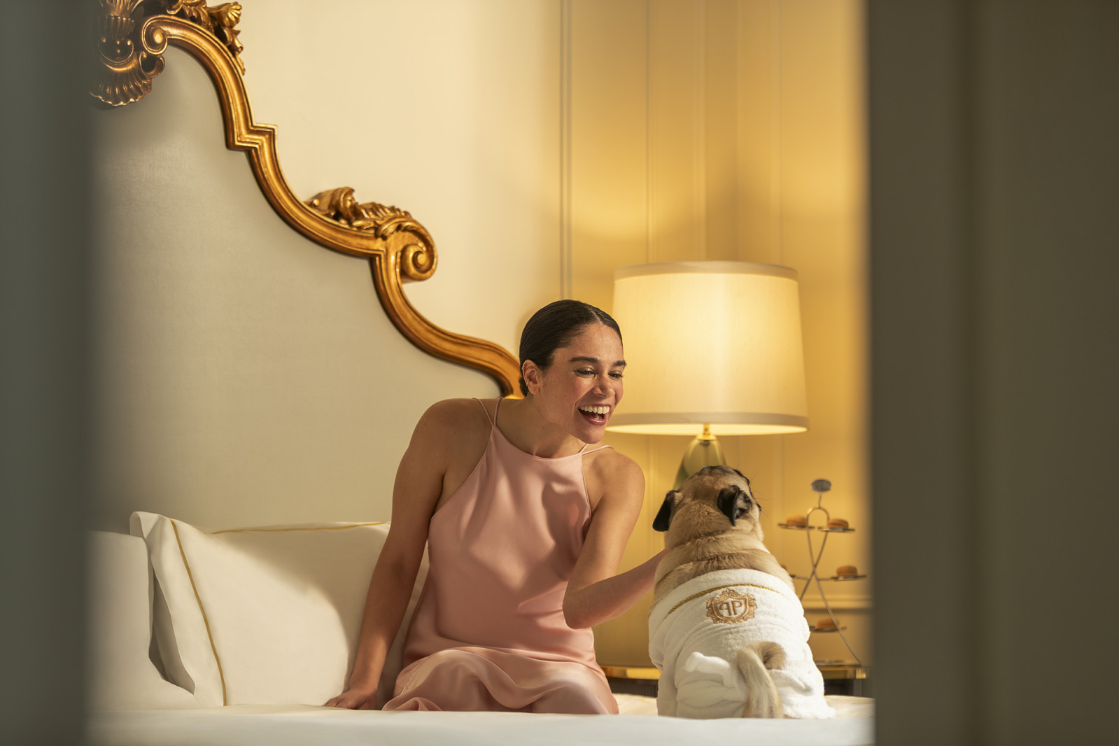 In-room dining and embroidered bathrobes are just a few of the treats pets get to enjoy at Fairmont on International Dog Day. (Photo: Fairmont Hotels and Resorts)