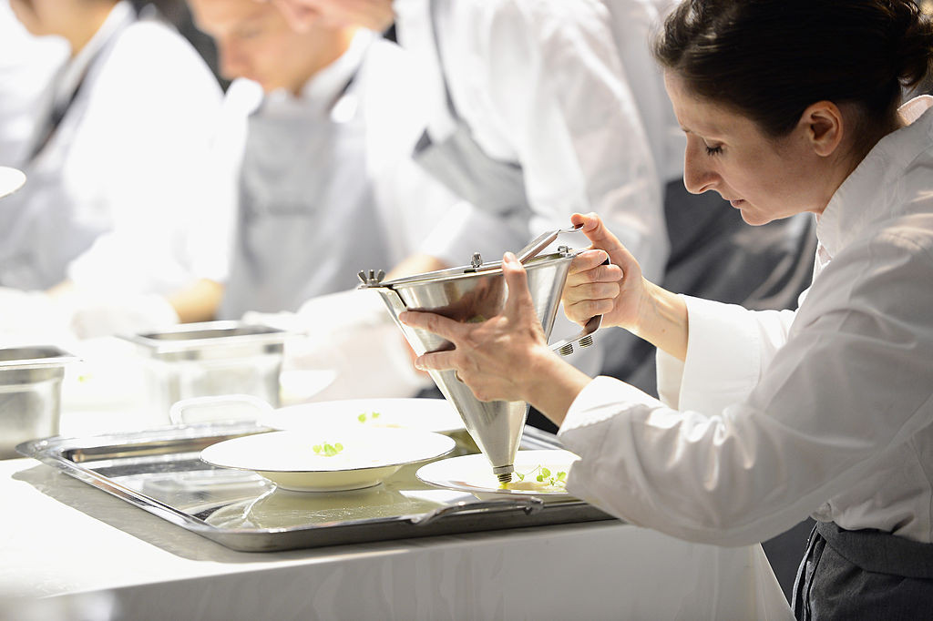 CANNES, FRANCE - MAY 15:  Electrolux partner chef Anne-Sophie Pic attends the Gala Dinner Preparation at Electrolux Agora Pavilion on May 15, 2013 in Cannes, France.  (Photo by Ian Gavan/WireImage for Electrolux)