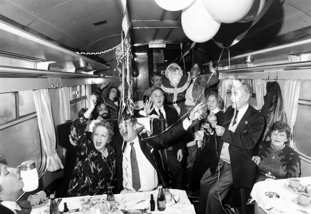 UNITED KINGDOM - MAY 04: Christmas party on board a train, December 1985. (Photo by SSPL/Getty Images)