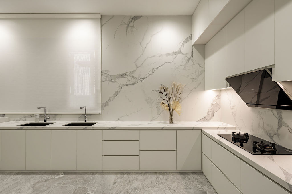 The kitchen area featuring marble coordination with surrounding finishes, demonstrating the meticulous attention to material transitions and joints throughout the house