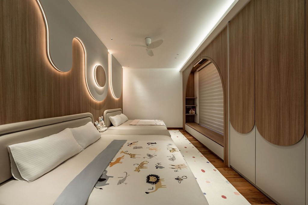 One of the six bedrooms on the upper level, featuring the timber flooring that Tiu now regrets choosing over stone, as it requires more maintenance than the ground floor’s natural stone