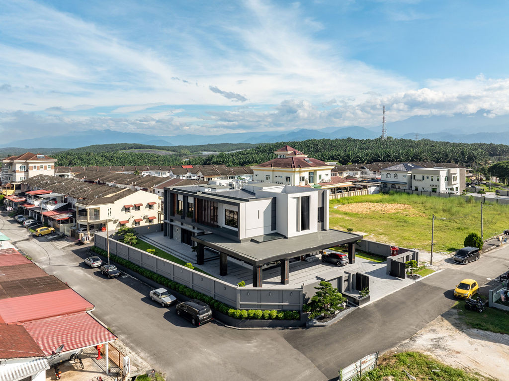 Aerial view of the villa showing its context within Bidor, Perak, revealing the thoughtful layout on the original empty plot that accommodates both guest and family zones without the pool that was never planned