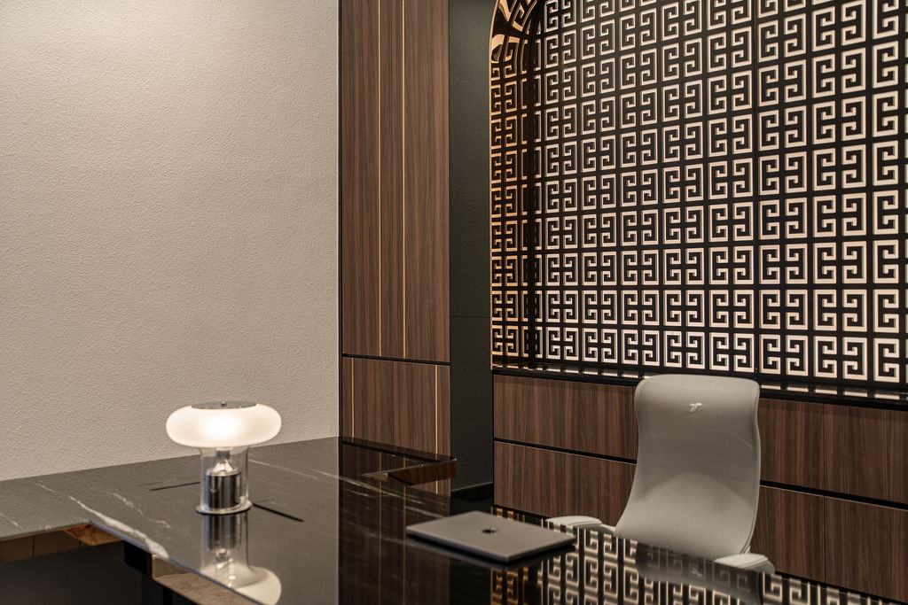 The dedicated office space providing complete privacy as part of the zoned layout, with eco-certified wood finishes maintaining material continuity throughout the villa