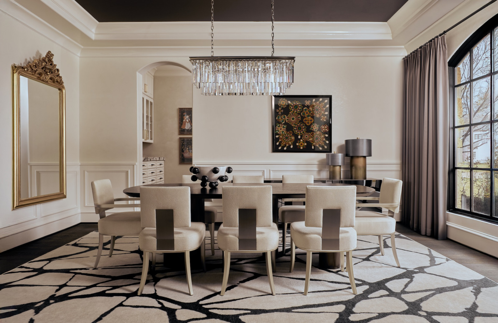 The elegant dining room in a Bunker Hill, Texas home designed by Studio Bilal Rehman