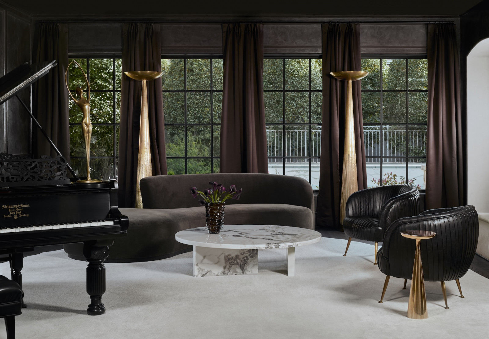 The formal living room of a renovated home in a Bunker Hill, Texas home designed by Studio Bilal Rehman