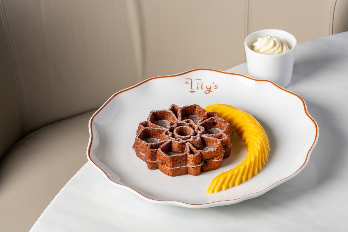Lily’s signature Thai Tea Waffle, delicately shaped like a water lily, reinterprets a beloved flavour with sculptural finesse