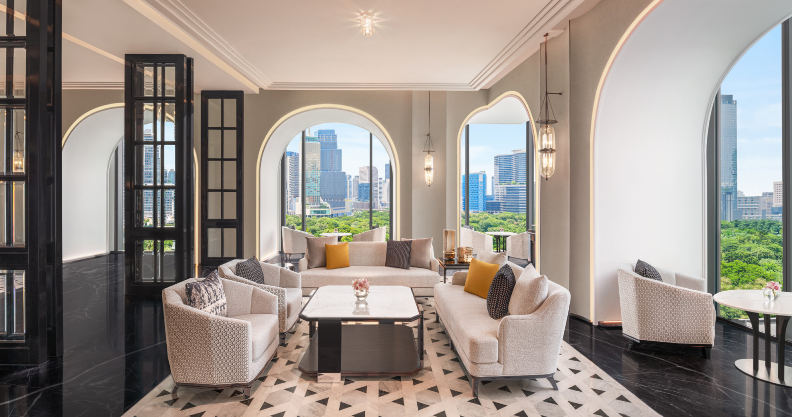A seating alcove framed by arches in the ninth-floor lobby, echoing the hotel’s formal, symmetrical interior language