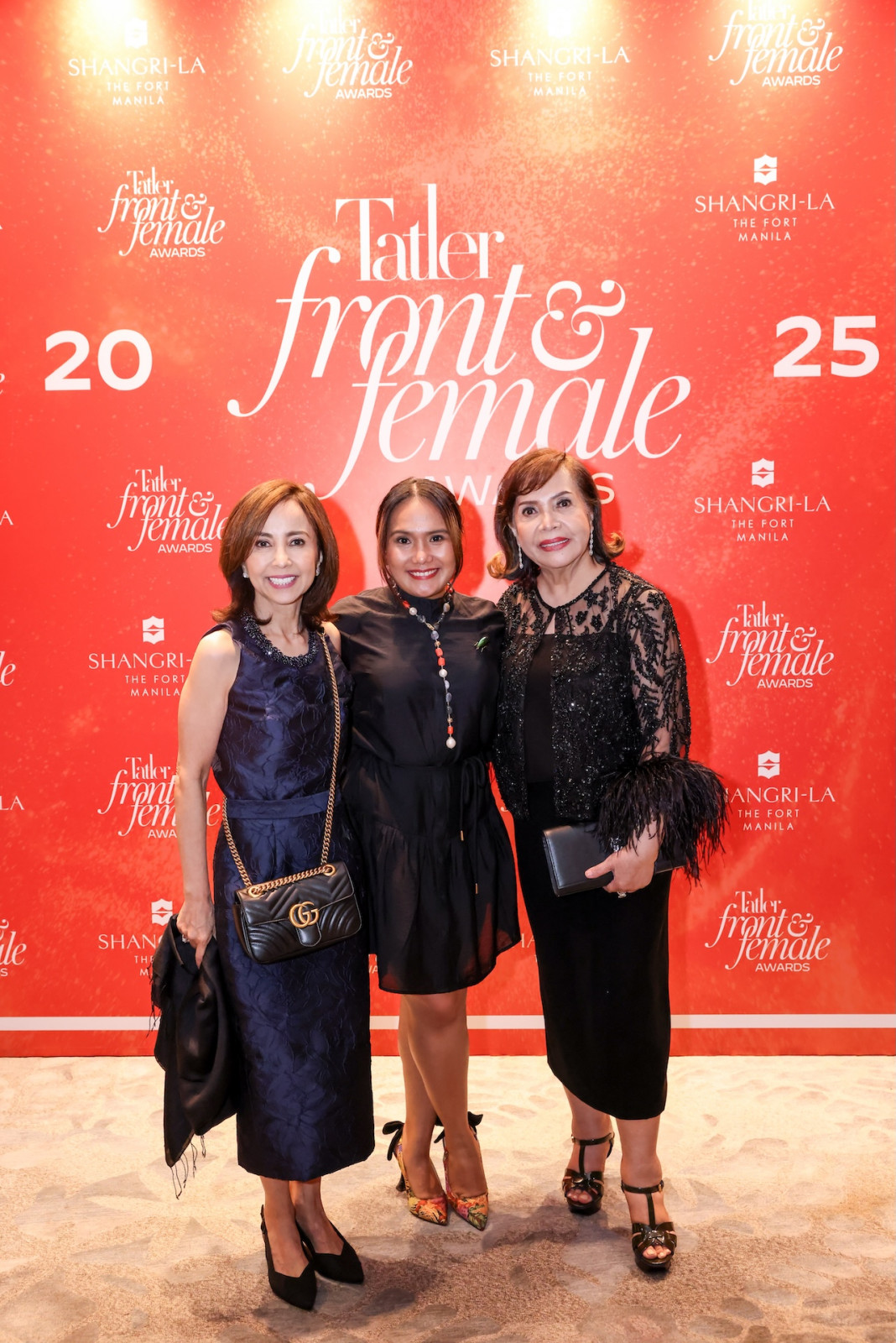 Karen Batungbacal, Cherrie Atilano and Marife Zamora at the Front & Female Awards Philippines 2025 photo wall