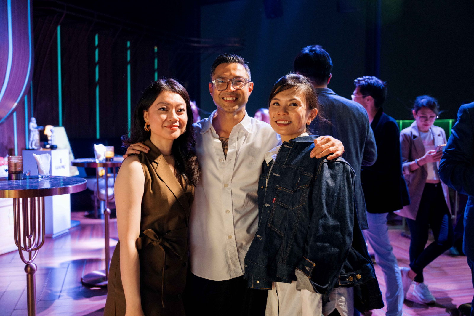 From left: XX, Omar Khan of Omar Khan Rugs, and Jennifer Choo