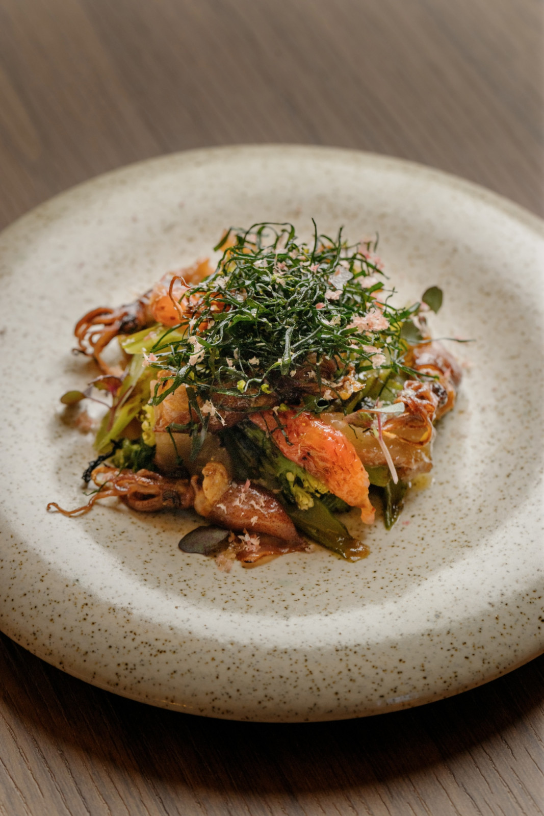 Leow’s rendition of rojak using grilled firefly squid and verjus-pickled strawberries (Photo: Belimbing) Mod-Sin cuisine singapore food