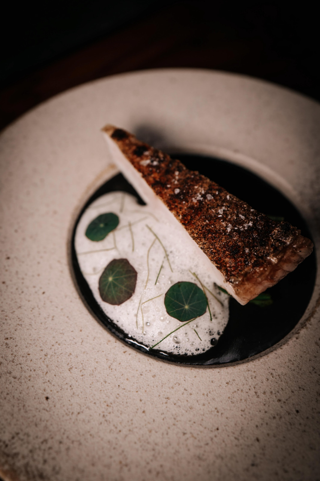 Law’s pairing of midin with aged coral trout, burnt coconut sauce and kaffir lime leaf foam (Photo: Province) Mod-Sin cuisine singapore food