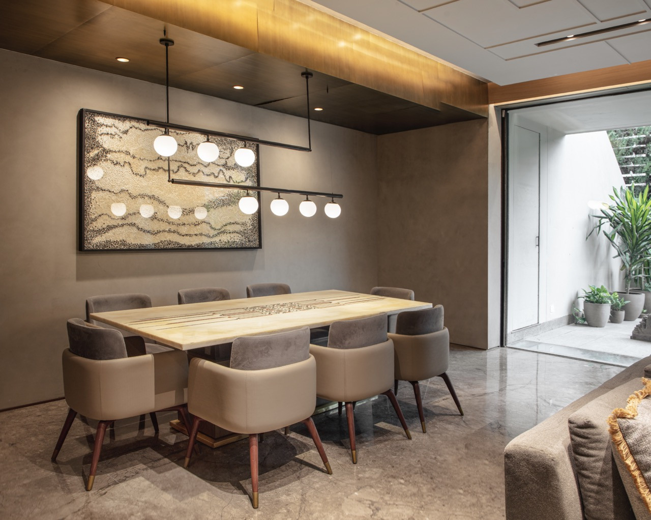 A secondary dining area shows the home's approach to multiple gathering spaces for the extended Bammi family